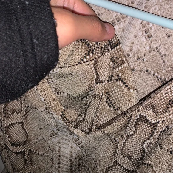 this is a body suit is from cage and it’s in good condition a medium - Picture 3 of 4